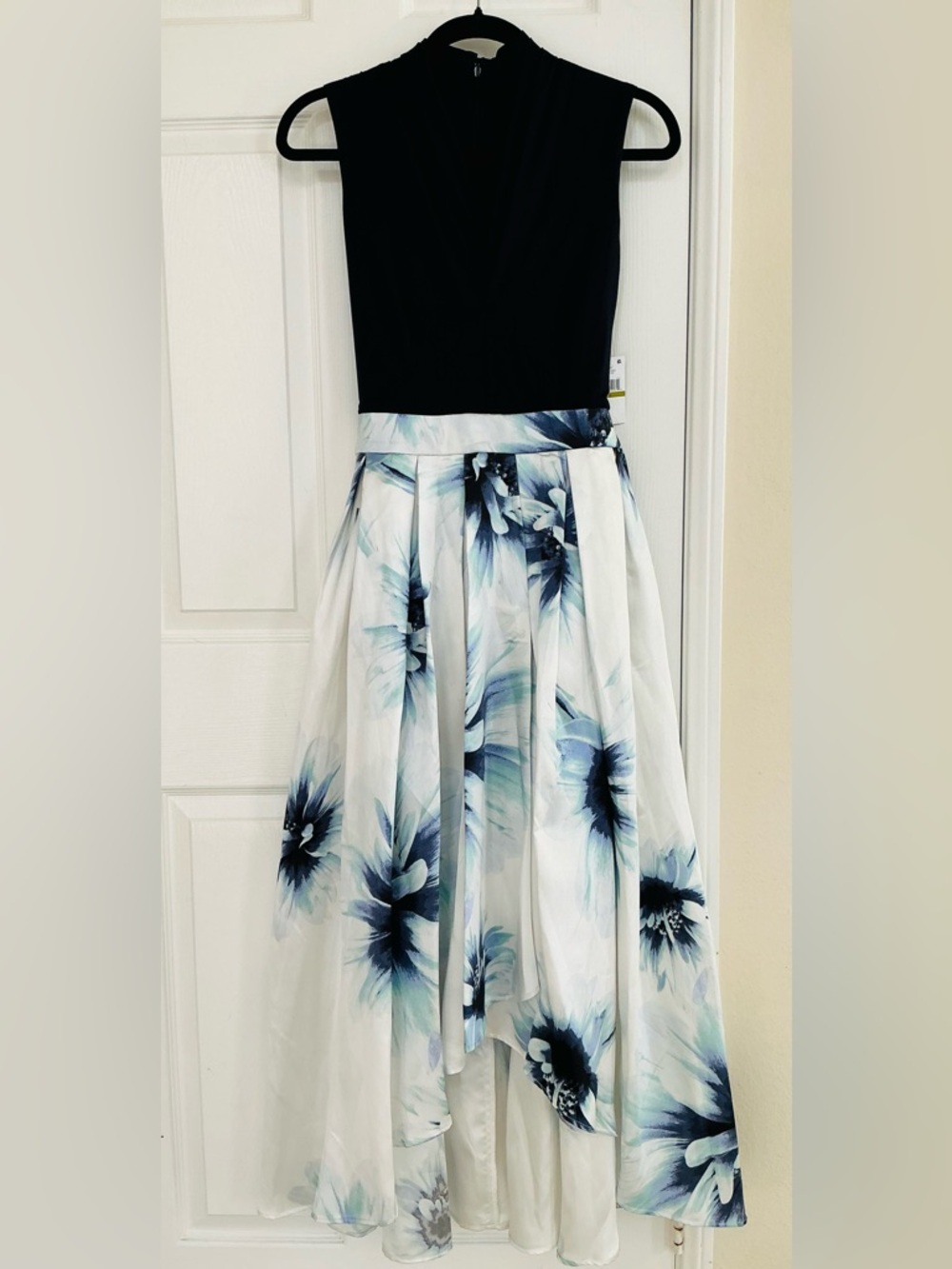 White Dress with Soft Blue Floral Accents